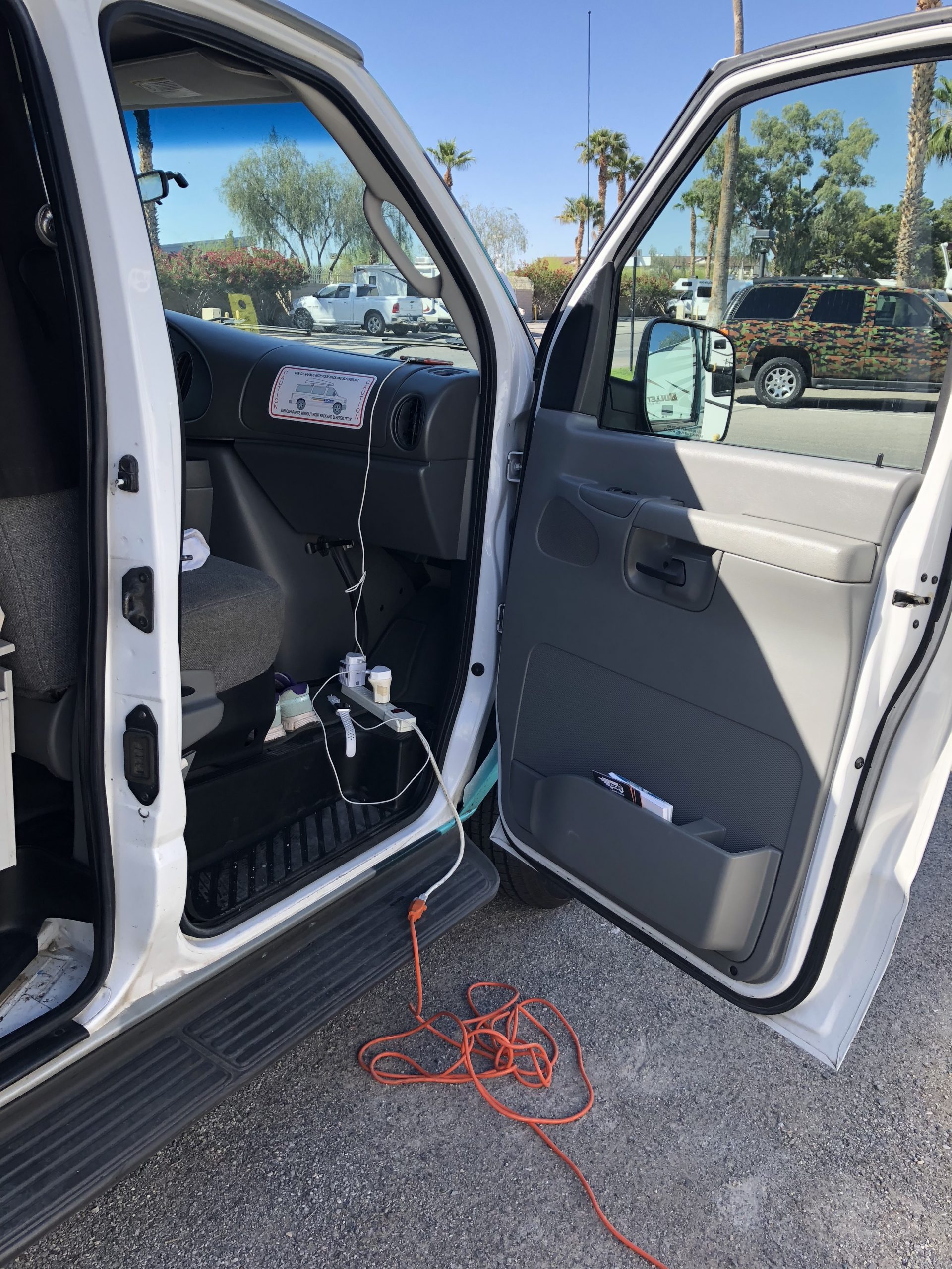 alt="charging in the van"