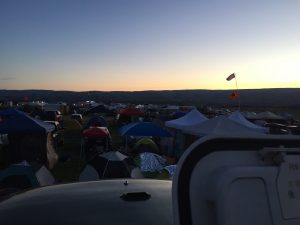 alt="sunset at festival camp"