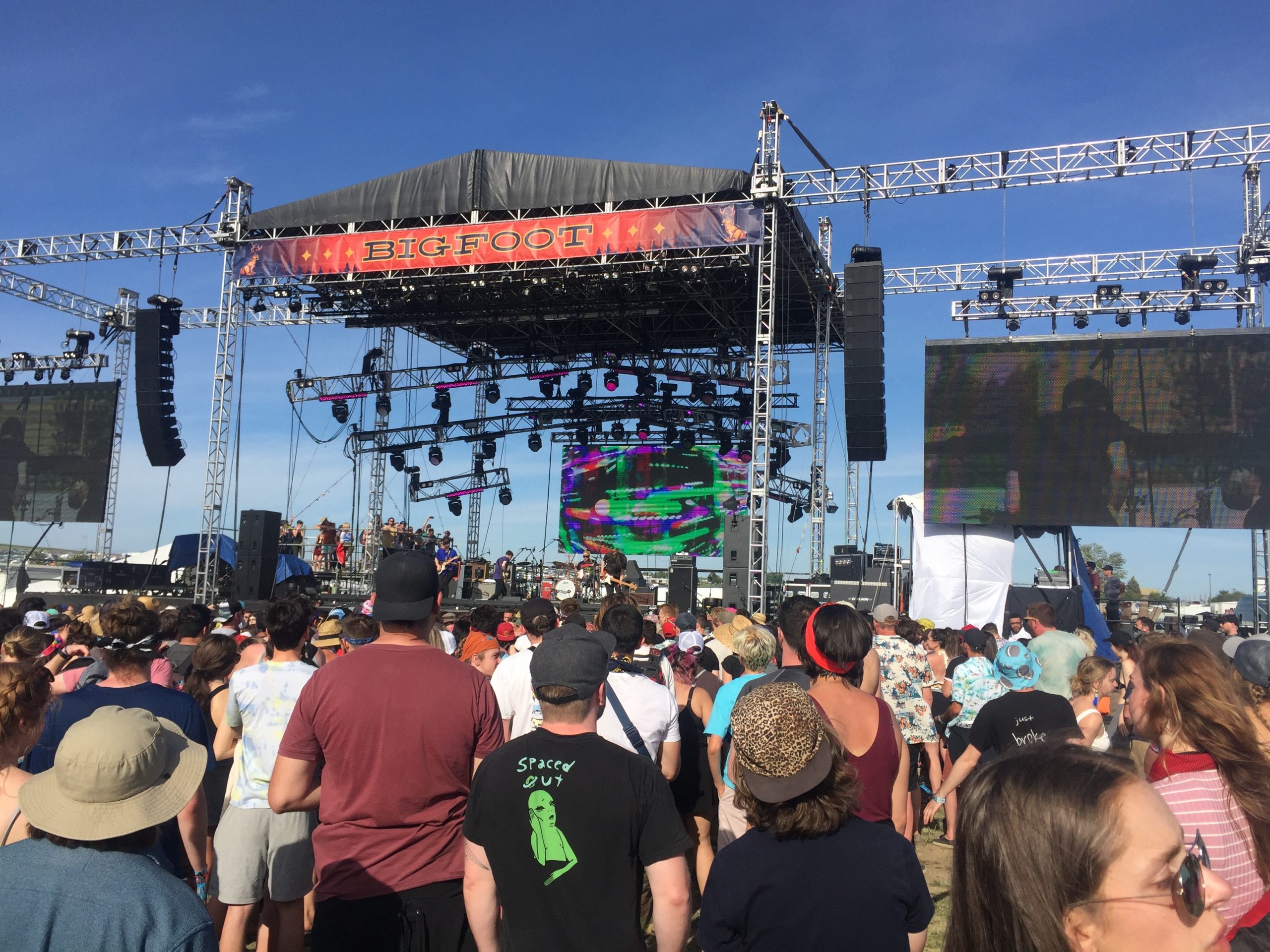 alt="Pup band on stage at festival"