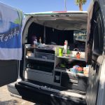 alt="the kitchen unit at the rear of the van"