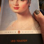 alt="woman on front cover of book"
