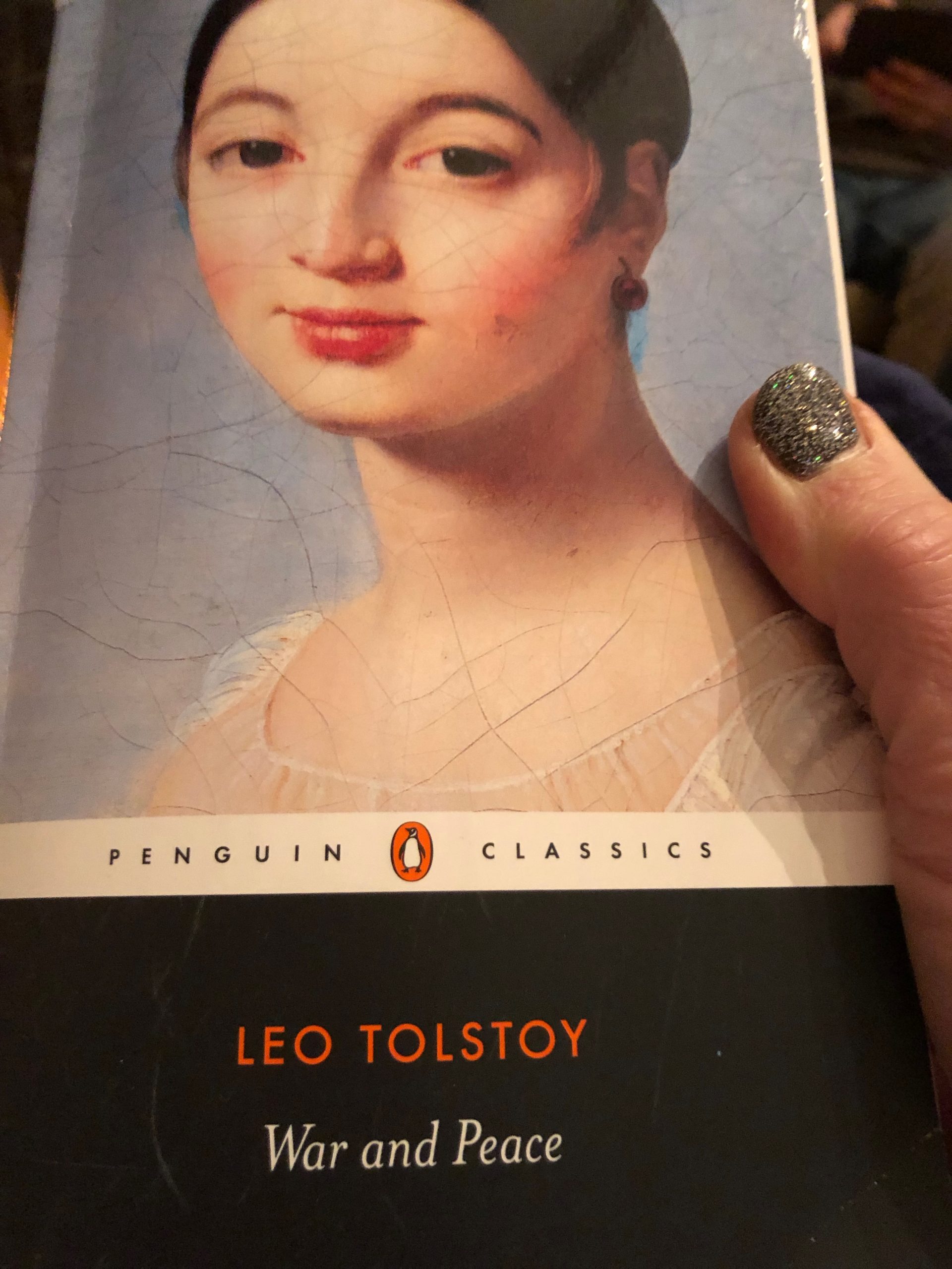 alt="woman on front cover of book"