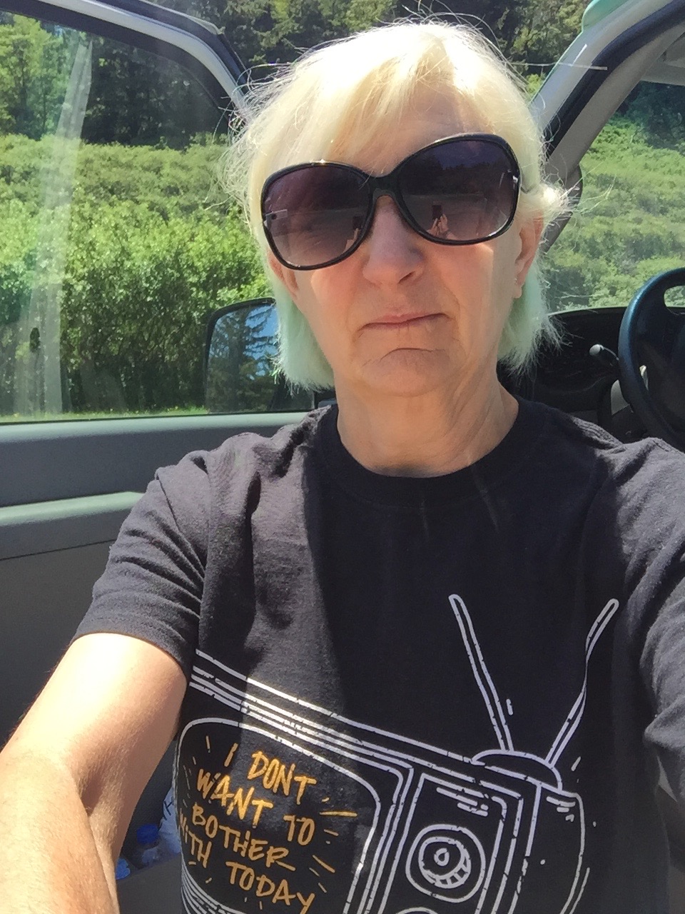 alt="image of me beside door of camper van