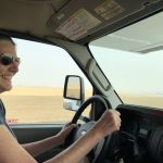 alt="close up of my friend driving"