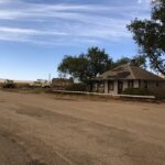 alt="old building & truck"