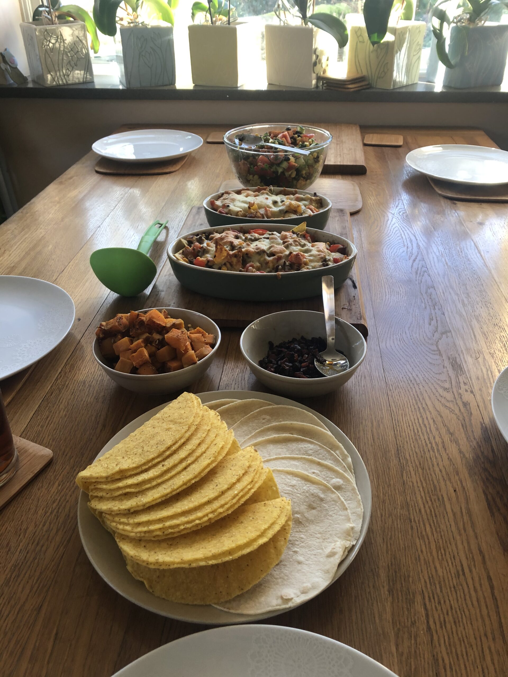 alt="various dishes of food on a table"