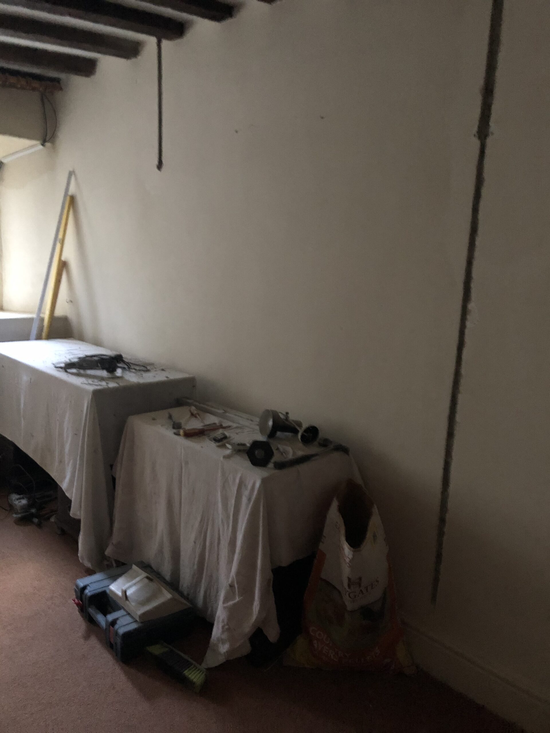 alt=wall ready for painting"