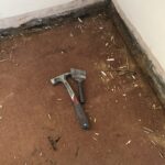 alt="hammer & bolster on floor"