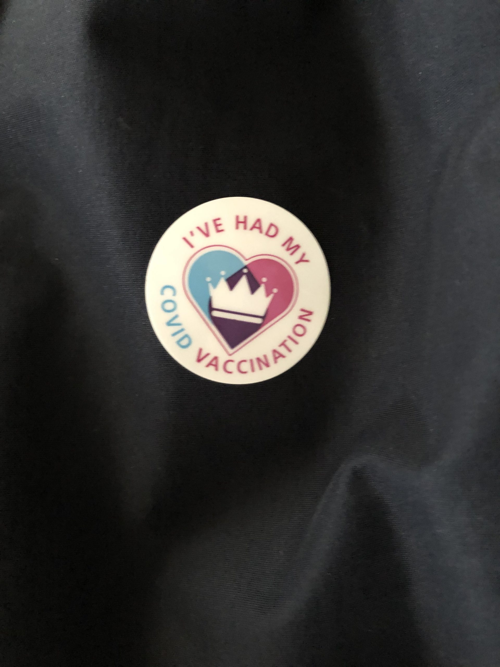 alt="sticker given after covid vaccination"