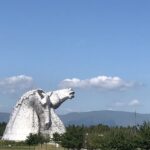 alt="two horses heads in distance"