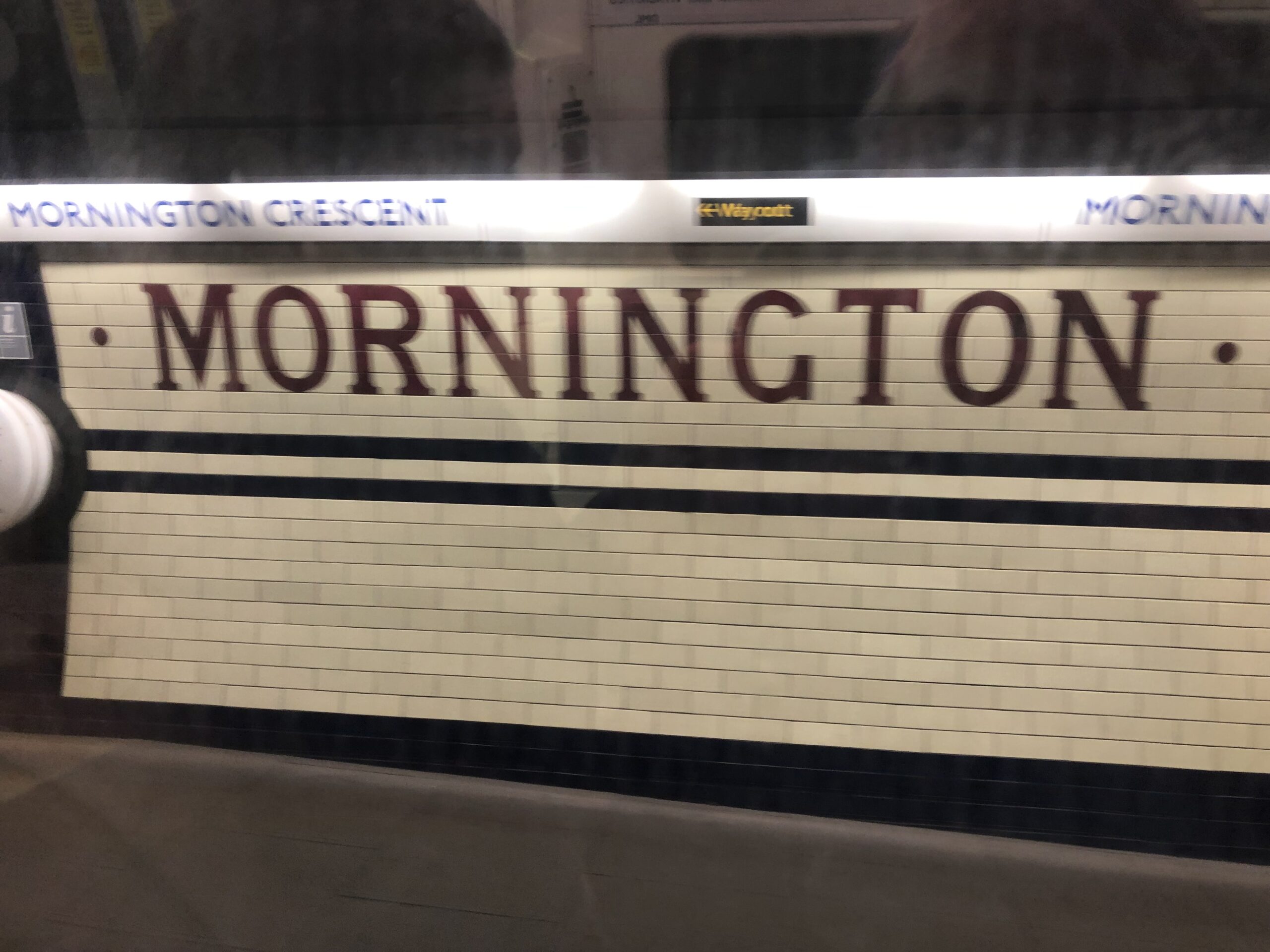 alt="Mornington cresent tube station sign"