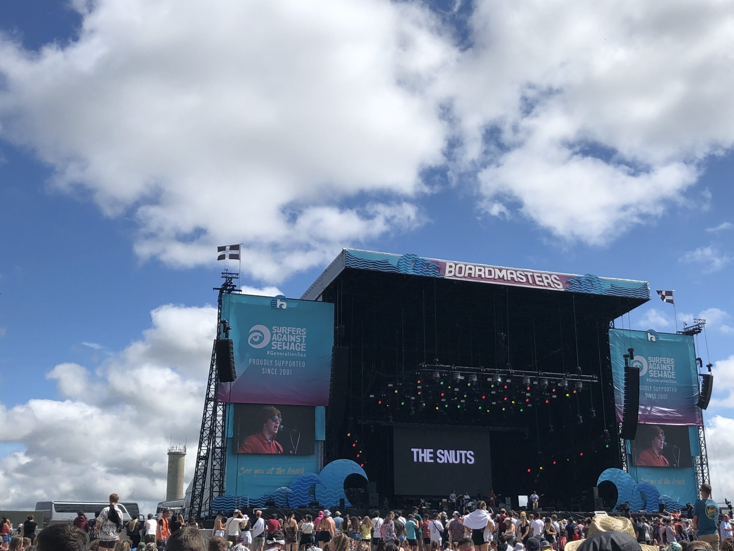 alt="stage with crowd in front"