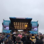 alt="stage with lights & crowd"