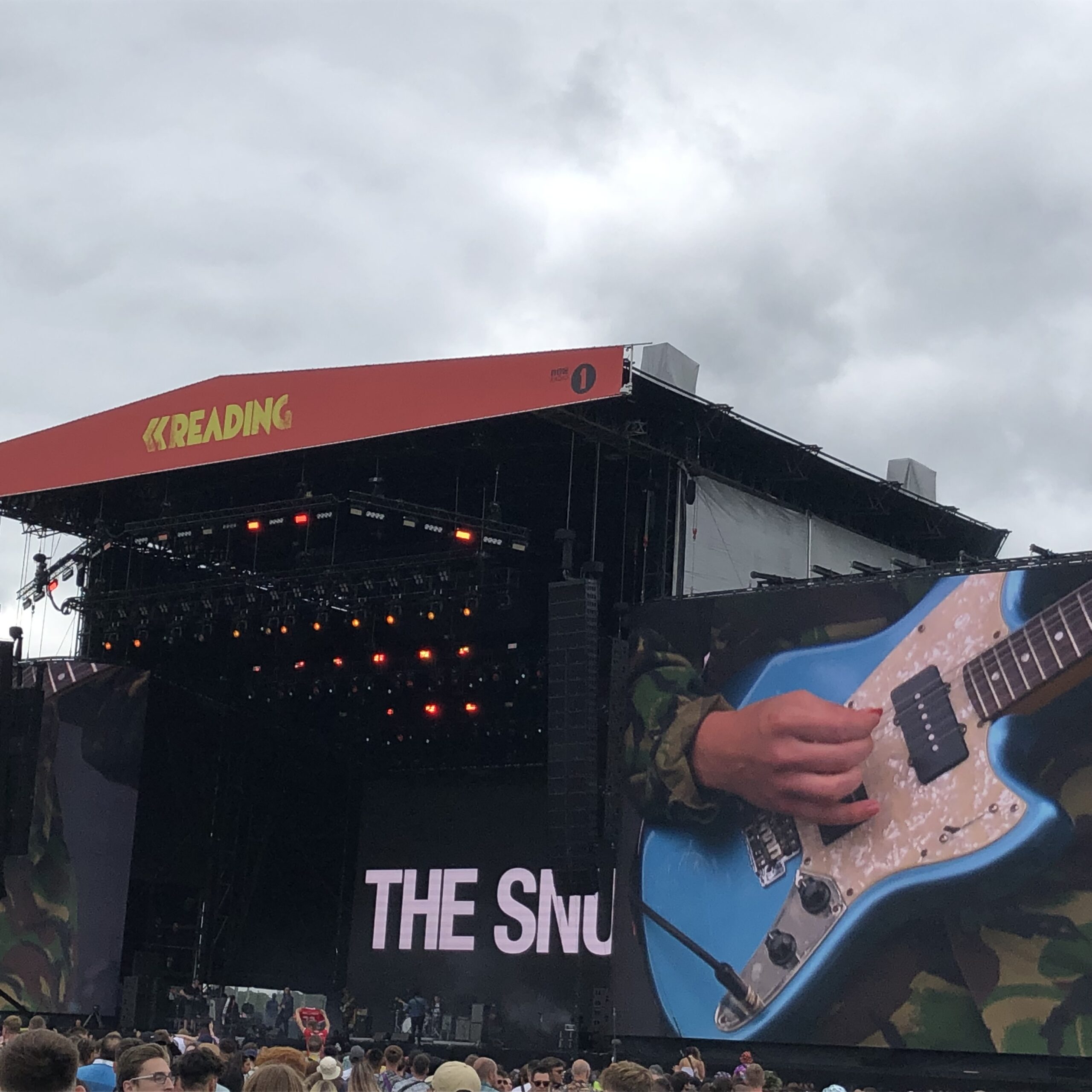 alt="big stage with image of a guitar"