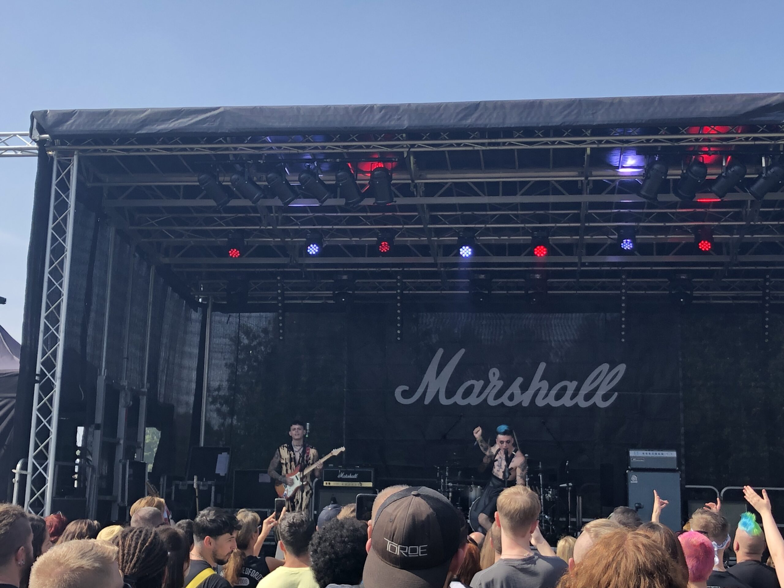 alt="the Hara band on stage"