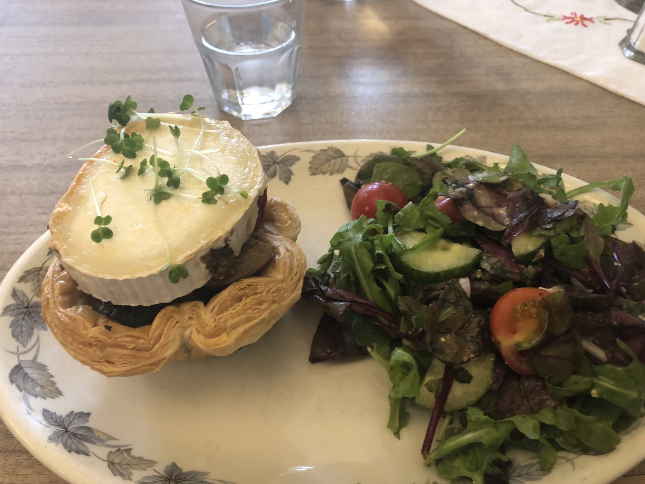 alt="cheese dish with salad"