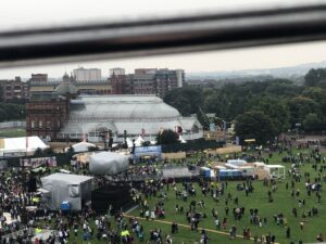 alt="view from the ferris wheel of the main stage & crowd"
