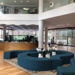 alt="lobby of hotel"