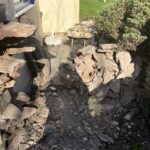 alt="gap in dry stone wall"