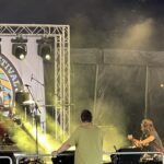 alt="stage with musicians"