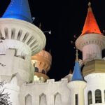 alt="coloured towers with pinnacles"