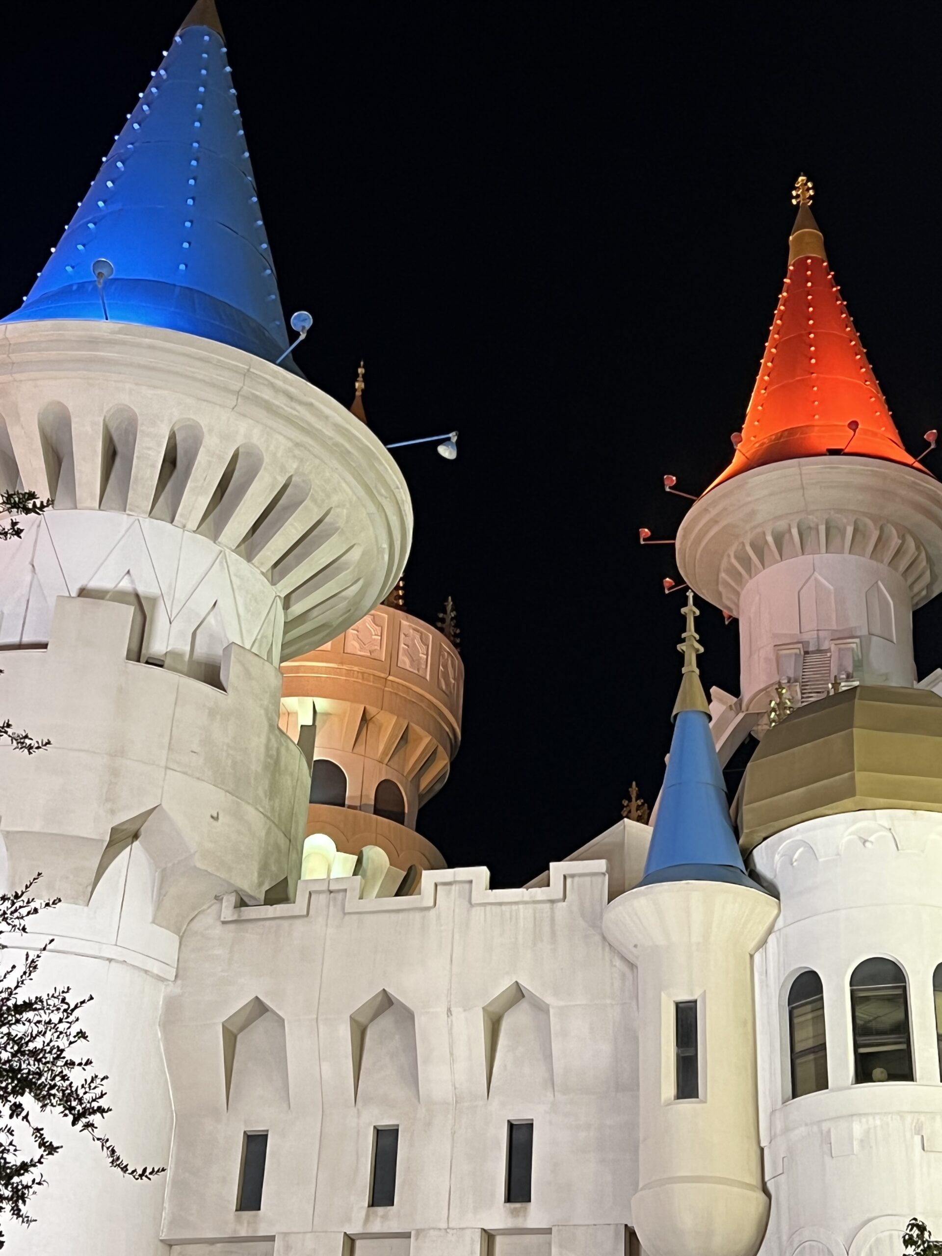 alt="coloured towers with pinnacles"