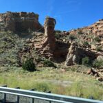 alt="rock formation by roadside"