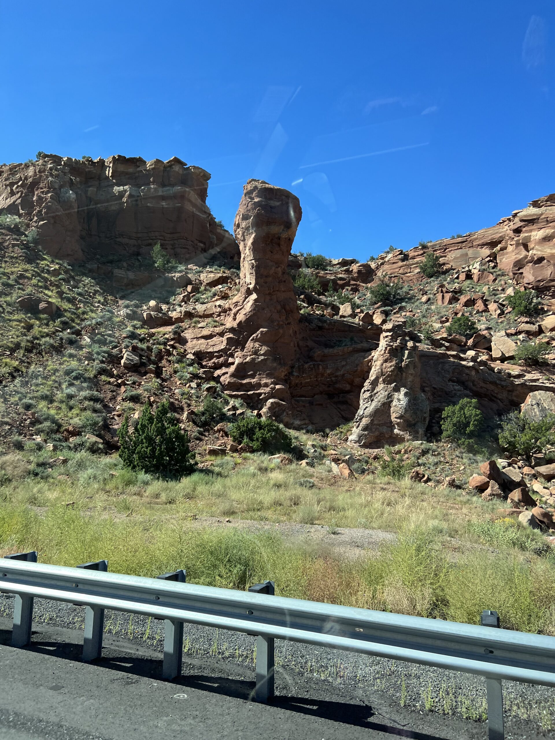 alt="rock formation by roadside"