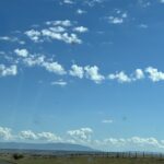 alt="sky with cloud & landscape"