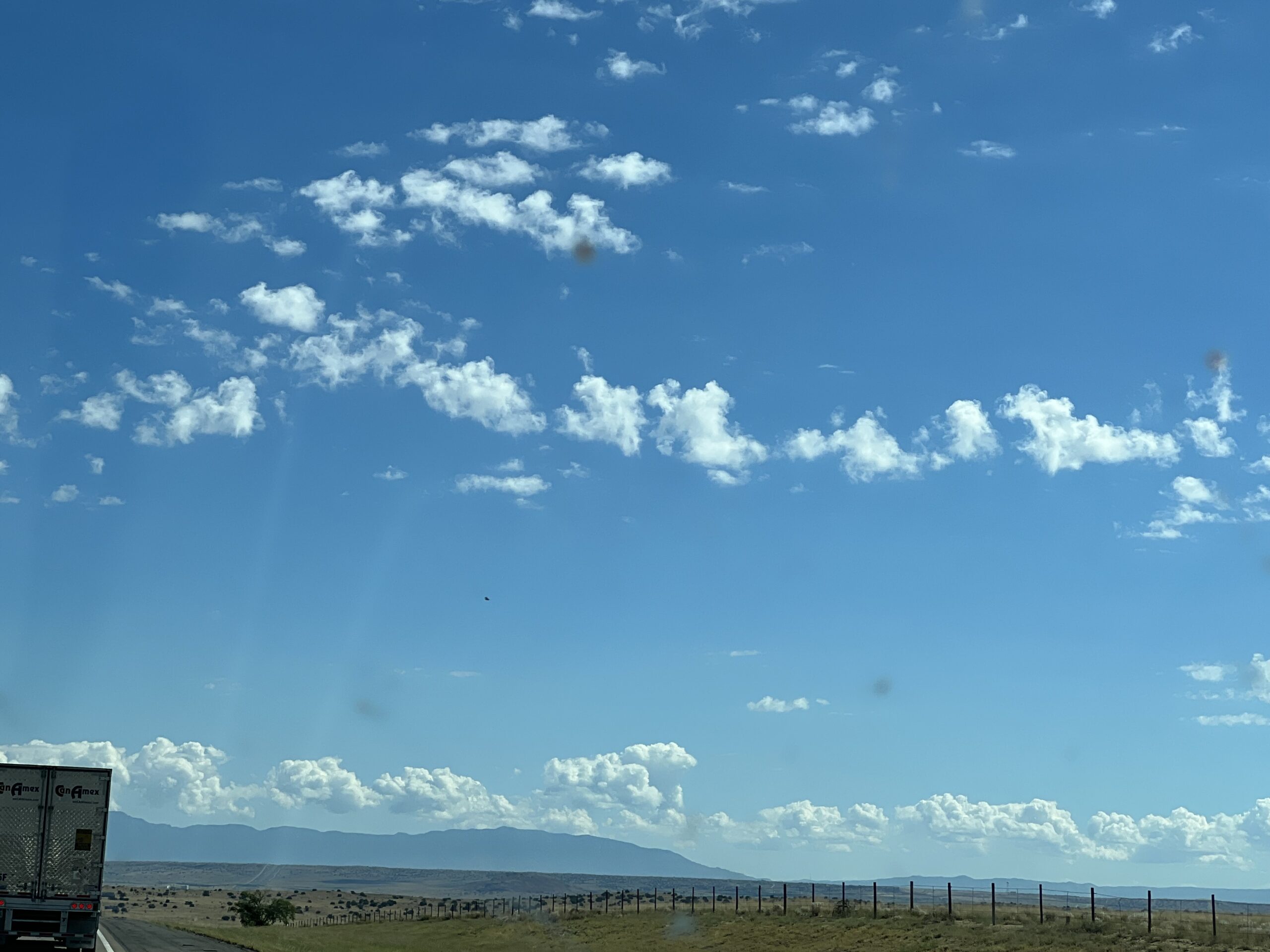 alt="sky with cloud & landscape"