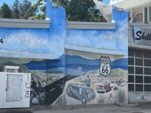alt="route 66 art work on wall"