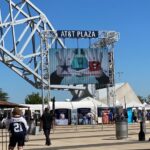 alt="outside the stadium with trade stands"