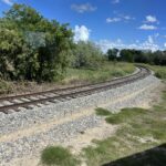 alt="curved railway track"