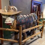 alt="model cow with hat on"