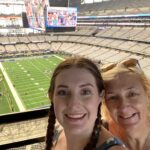 alt="selfie of daughter & me with pitch in background"