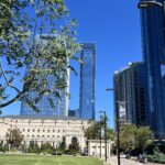 alt="town square with buildings"