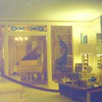 alt="living room with grand piano"