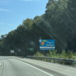 alt="road sign on side of the road"