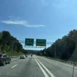 alt="road signs above the road