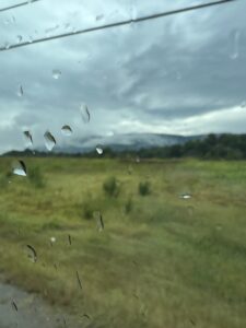 alt="rain on van window"