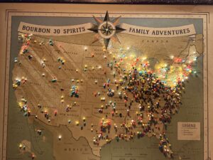 alt="map of USA with pins in it"