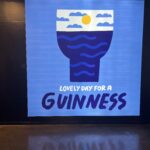 alt="poster with glass with waves"