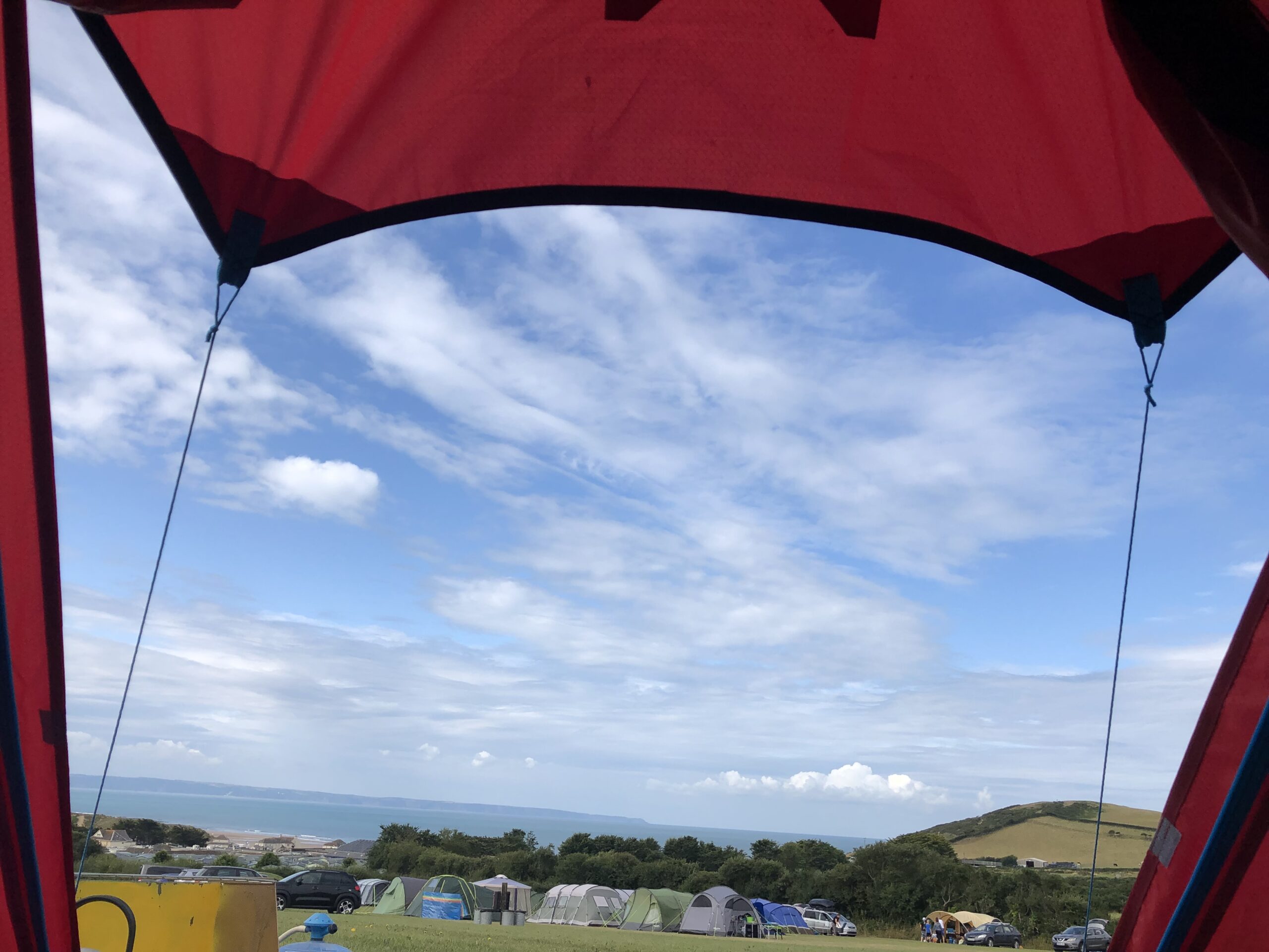 alt="tent flap & sky"
