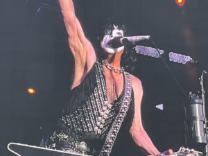 alt="guitarist with painted face"