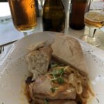 alt="plate of food with meat & bread"