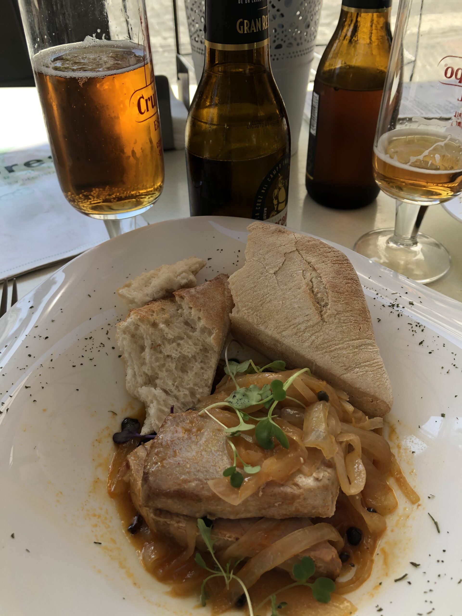 alt="plate of food with meat & bread"