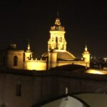 alt="illuminated rooftops"