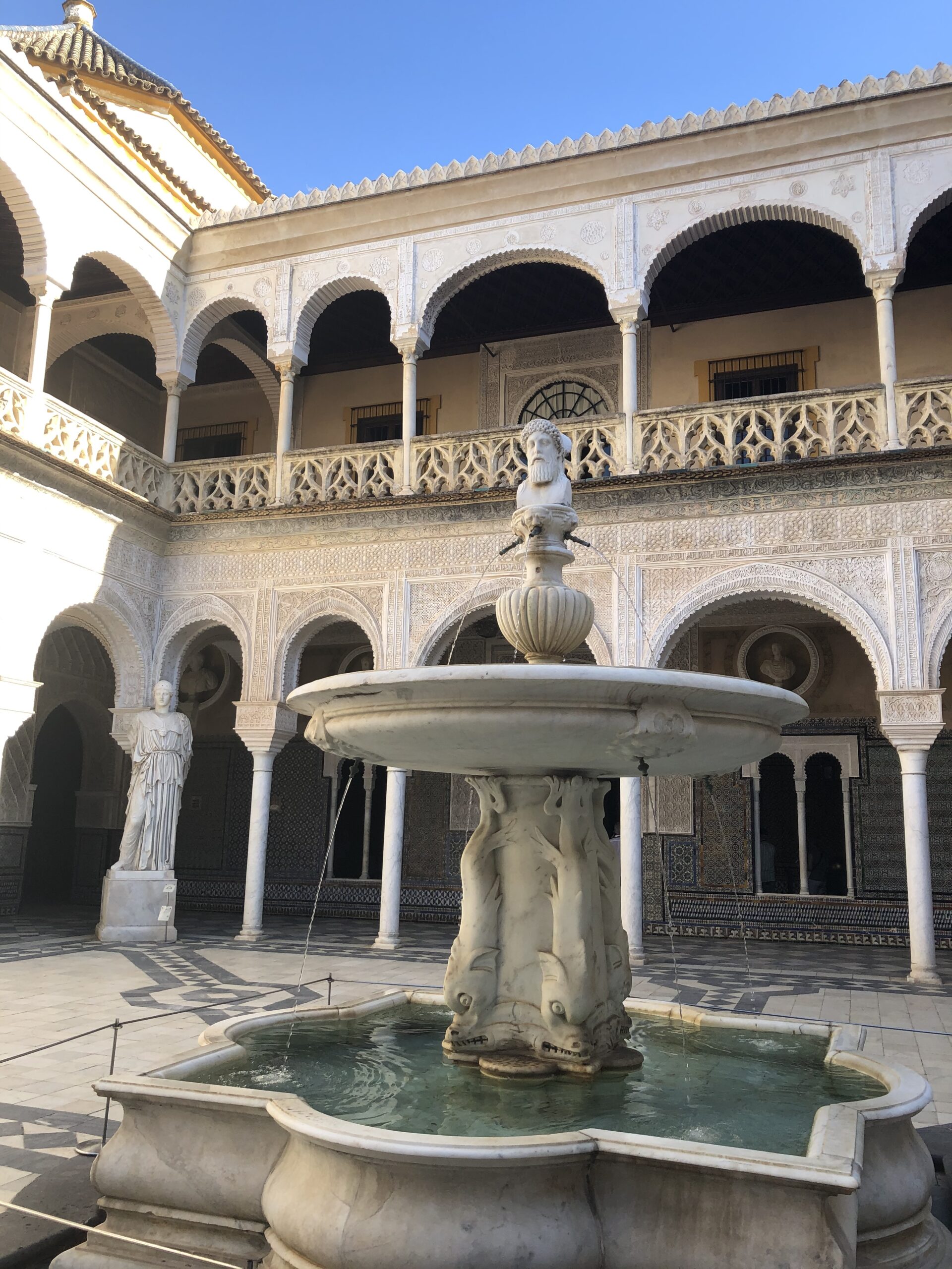 alt="fountain in a courtyard"