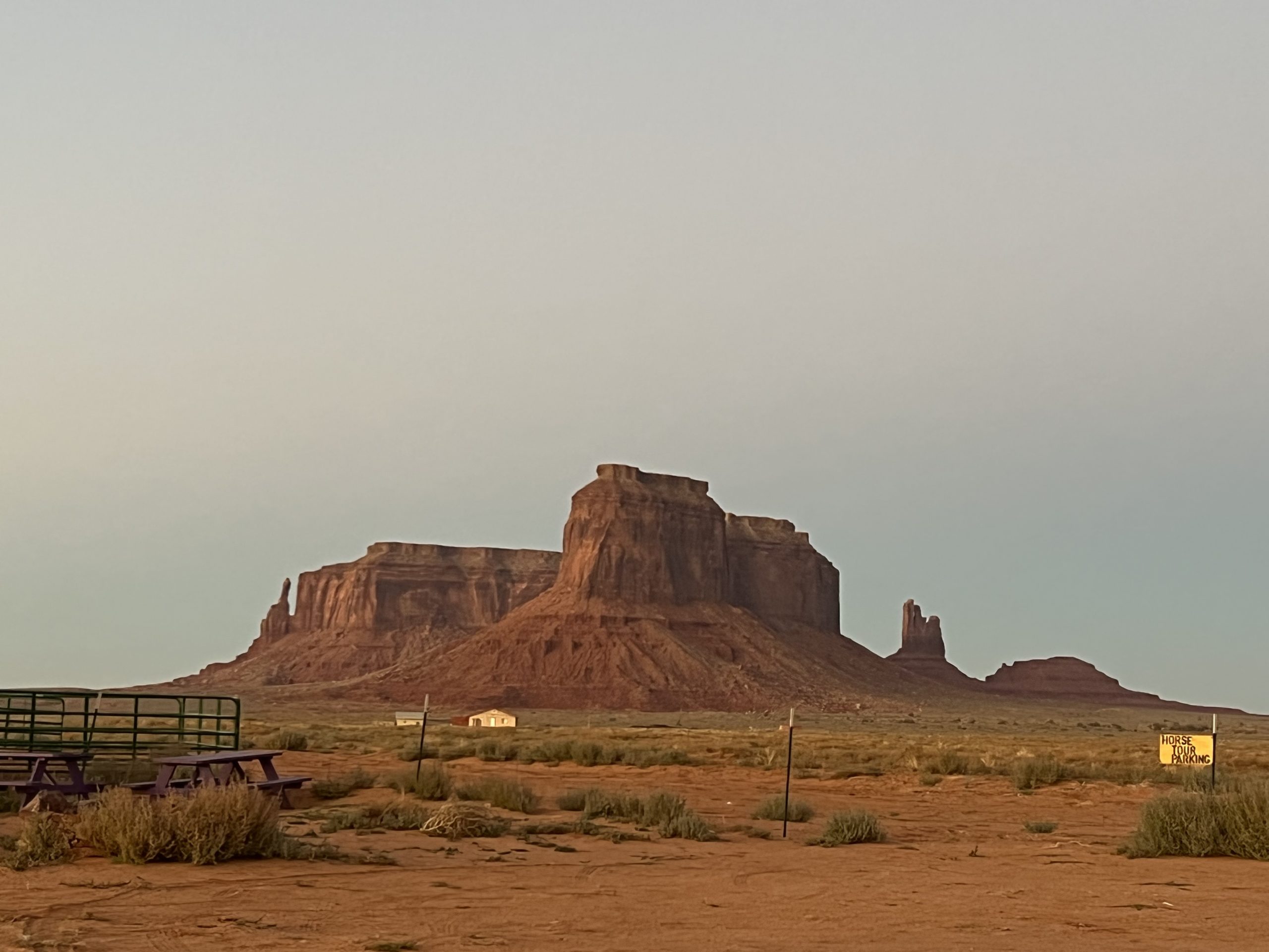 alt="sunset near rocky outcrop"