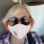 alt="me with a face mask on"